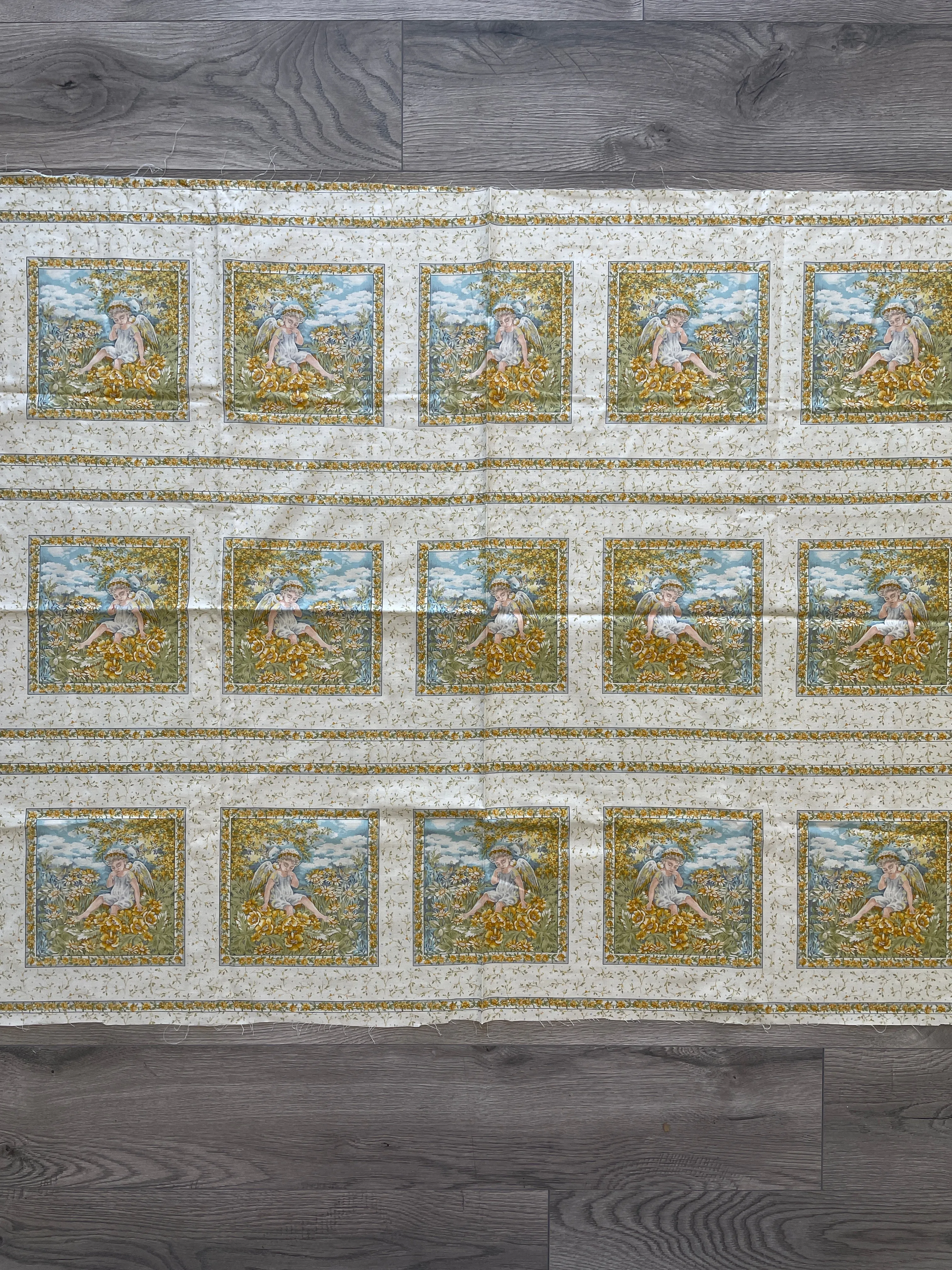 1 YD Quilting Cotton -  Off White with Cherubs and Yellow Flowers