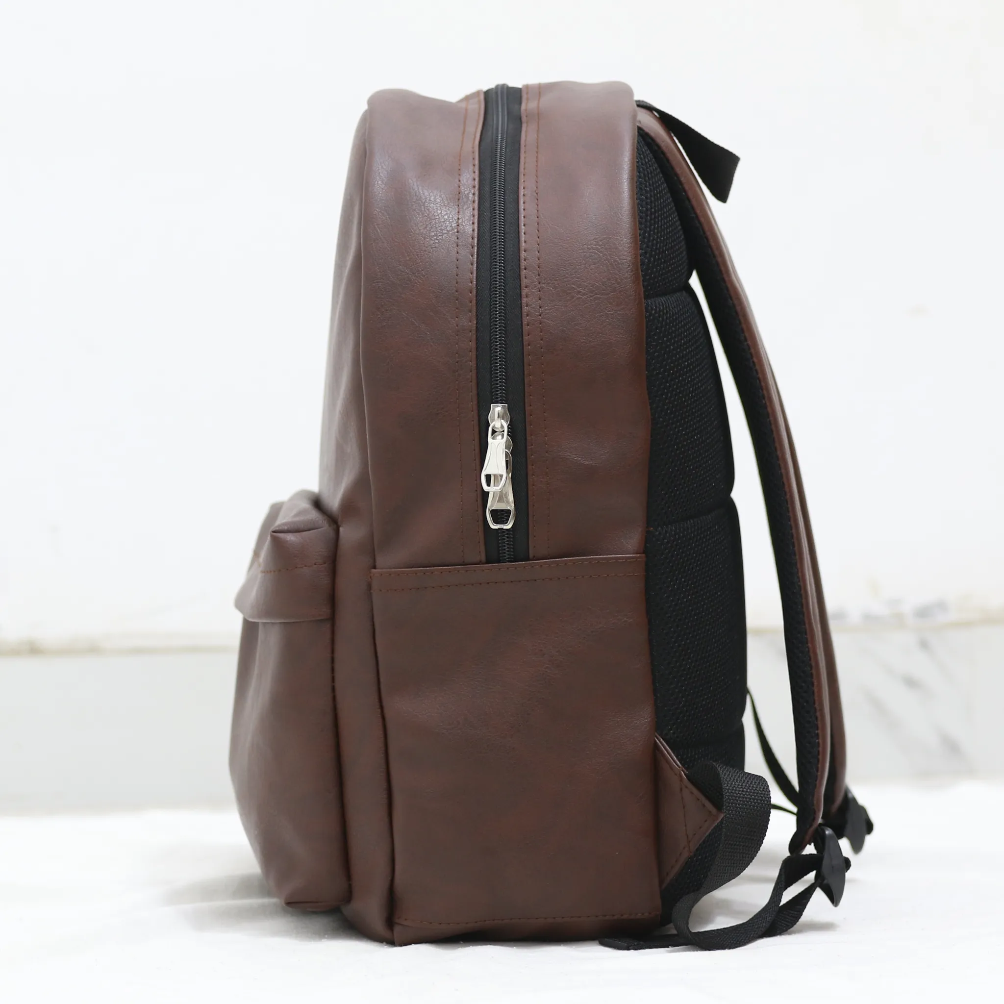 BP44 – Premium Synthetic Leather Simple Laptop Backpack